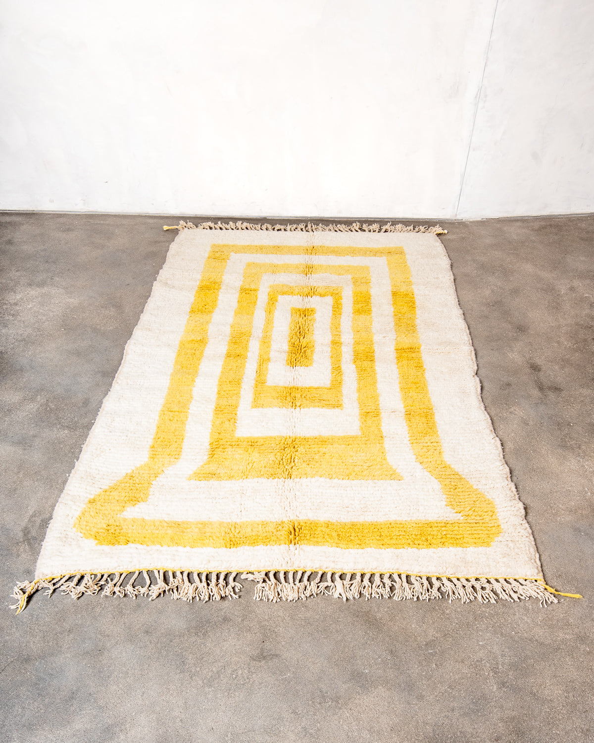 Modern, designer, handcrafted Berber rug from Morocco. Beniourain carpet with beautiful colours and patterns and fluffy wool texture.